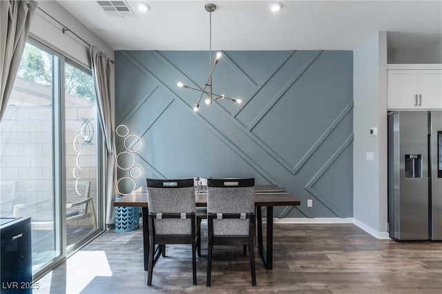 2530 Catallo St, Henderson, NV 89044 - dining space with a decorative wall, a chandelier, dark wood-style flooring, and recessed lighting