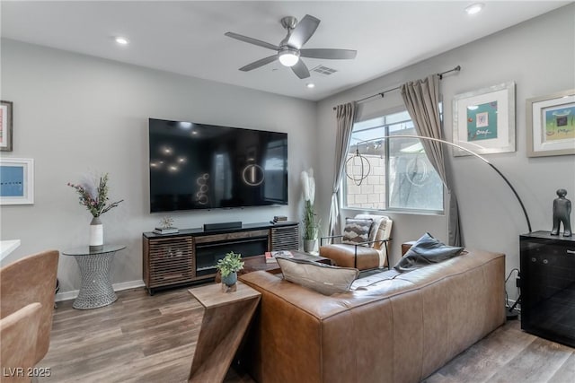 2530 Catallo St, Henderson, NV 89044 - living area featuring wood finished floors, ceiling fan, and recessed lighting