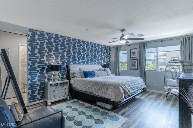 2530 Catallo St, Henderson, NV 89044 - bedroom with wood finished floors and a ceiling fan