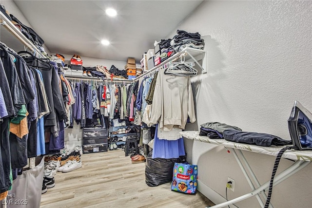 9340 W Washburn Rd, Las Vegas, NV 89149 - spacious closet with wood finished floors