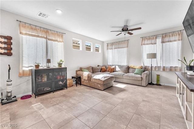 4332 Stardusk Falls Ave, North Las Vegas, NV 89084 - tiled living area with ceiling fan and plenty of natural light