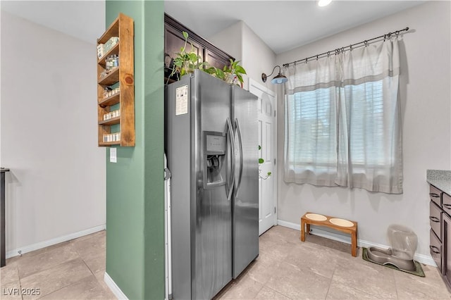 4332 Stardusk Falls Ave, North Las Vegas, NV 89084 - kitchen featuring stainless steel fridge and light tile patterned floors