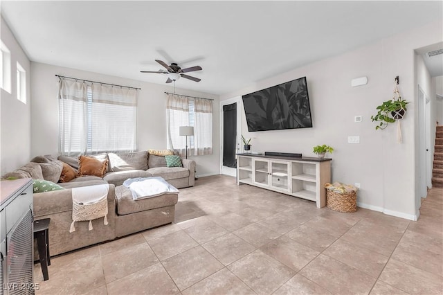 4332 Stardusk Falls Ave, North Las Vegas, NV 89084 - tiled living area with ceiling fan and stairway