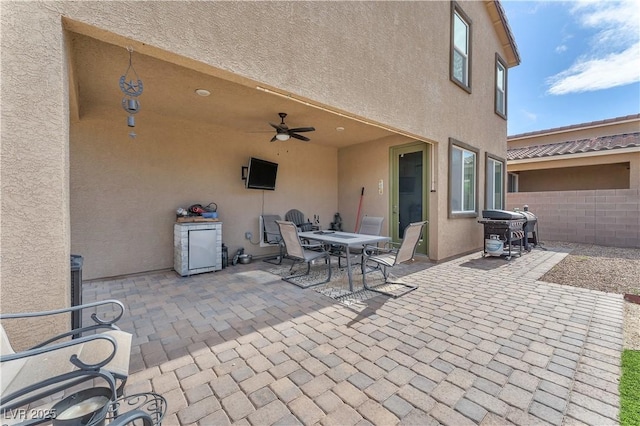 4332 Stardusk Falls Ave, North Las Vegas, NV 89084 - view of patio with area for grilling, ceiling fan, and outdoor dining area