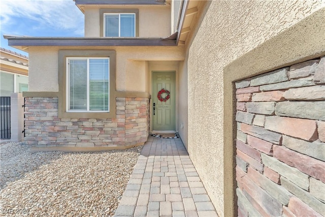4332 Stardusk Falls Ave, North Las Vegas, NV 89084 - property entrance featuring stucco siding and stone siding