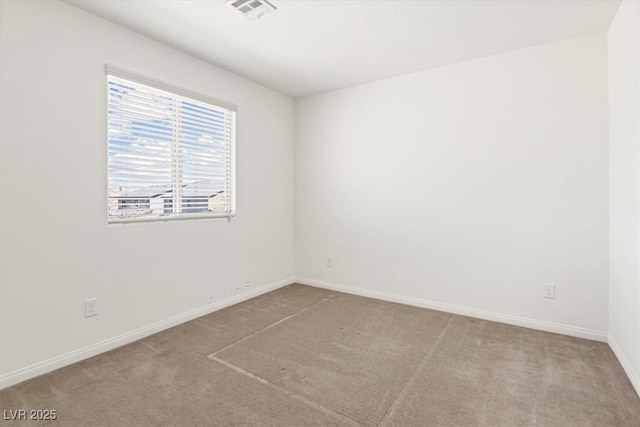 9268 Wildfire Gorge St, Las Vegas, NV 89139 - carpeted empty room with baseboards