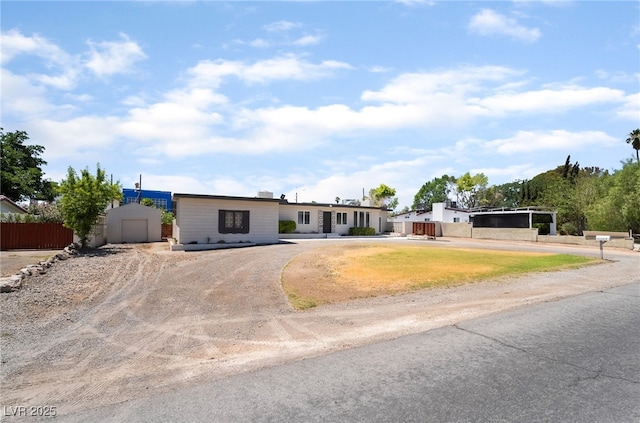 5617 Alfred Dr, Las Vegas, NV 89108 - view of front of home featuring curved driveway and a carport