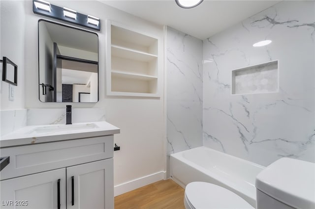 5617 Alfred Dr, Las Vegas, NV 89108 - full bathroom featuring vanity, wood finished floors, and shower / tub combination