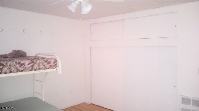 168 Lilith Ave, Pioche, NV 89043 - unfurnished bedroom with light wood-type flooring and a ceiling fan