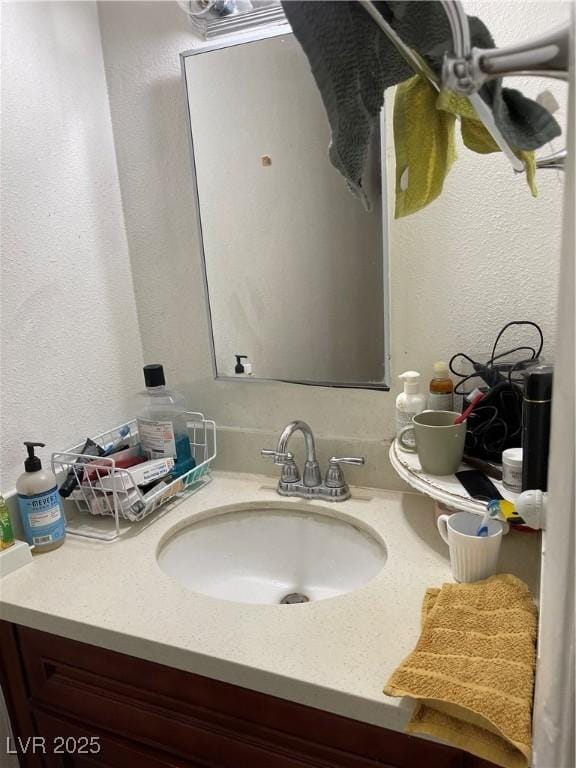 4017 Edgeford Pl, Las Vegas, NV 89102 - bathroom with vanity and a textured wall