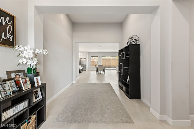 8575 Nicholas James Ave, Las Vegas, NV 89143 - hall featuring light tile patterned floors