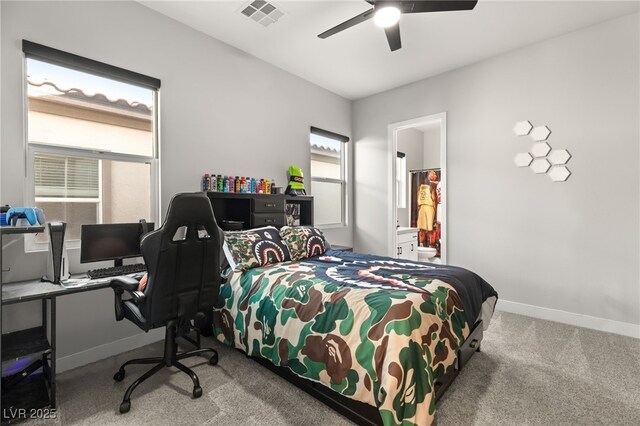 8575 Nicholas James Ave, Las Vegas, NV 89143 - carpeted bedroom with a desk, ceiling fan, and connected bathroom
