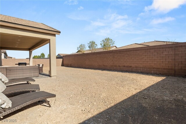 8575 Nicholas James Ave, Las Vegas, NV 89143 - fenced backyard featuring a patio