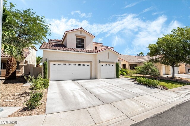 532 Kavanagh Pl, Las Vegas, NV 89123 - mediterranean / spanish-style home with stucco siding, a tile roof, an attached garage, and driveway