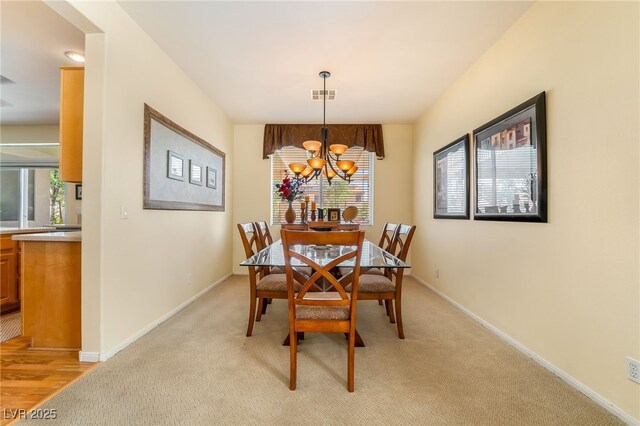 532 Kavanagh Pl, Las Vegas, NV 89123 - dining space with a chandelier and light carpet