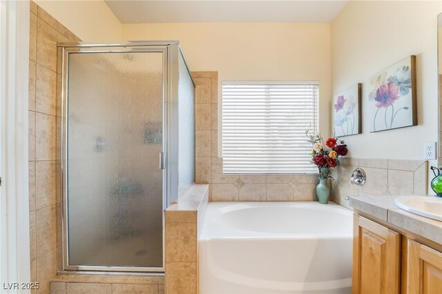 532 Kavanagh Pl, Las Vegas, NV 89123 - full bathroom featuring a stall shower, vanity, and a garden tub