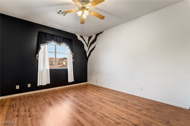 532 Kavanagh Pl, Las Vegas, NV 89123 - unfurnished room featuring wood finished floors and a ceiling fan