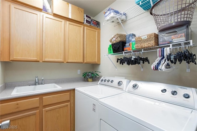 7816 Glowing Peak St, Las Vegas, NV 89131 - laundry room featuring independent washer and dryer and cabinet space