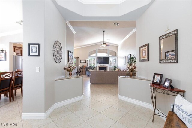 7816 Glowing Peak St, Las Vegas, NV 89131 - hall with ornamental molding, light tile patterned flooring, and vaulted ceiling