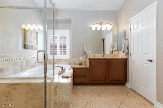 7816 Glowing Peak St, Las Vegas, NV 89131 - bathroom with vanity, tile patterned flooring, a bath, and a shower stall
