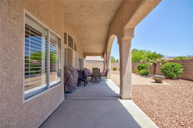 7816 Glowing Peak St, Las Vegas, NV 89131 - fenced backyard with a patio area