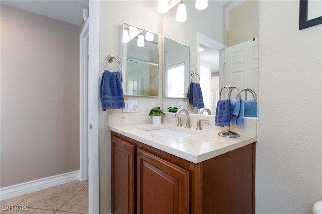 7816 Glowing Peak St, Las Vegas, NV 89131 - full bathroom featuring tile patterned floors, vanity, and an enclosed shower