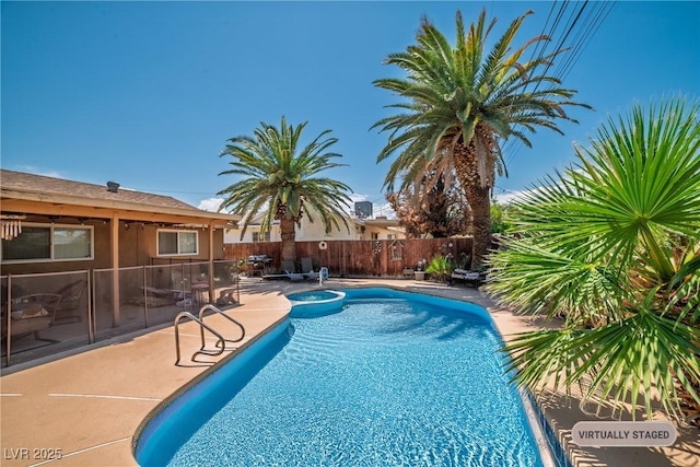 2009 E Oakey Blvd, Las Vegas, NV 89104 - view of swimming pool featuring a patio area and a pool with connected hot tub
