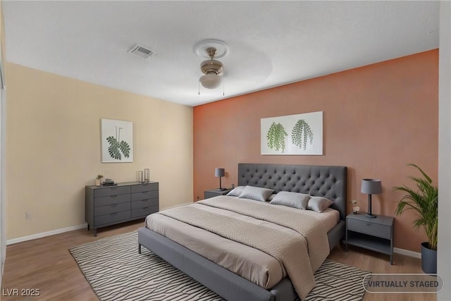 2009 E Oakey Blvd, Las Vegas, NV 89104 - bedroom with wood finished floors and baseboards