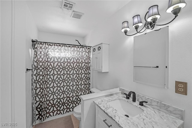 2009 E Oakey Blvd, Las Vegas, NV 89104 - bathroom with vanity, a shower with curtain, and a chandelier