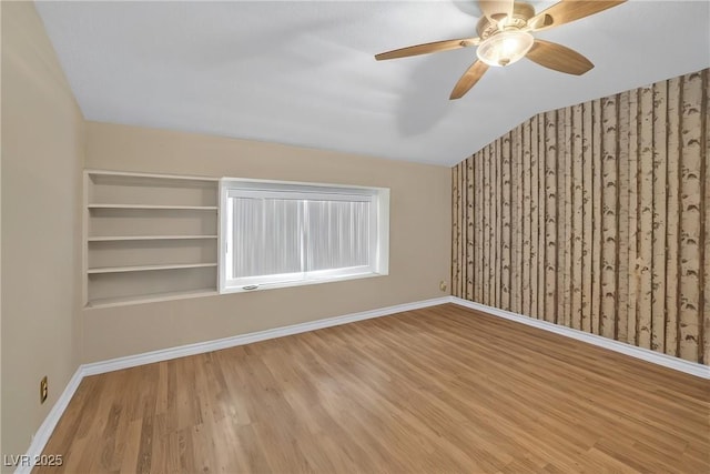 2009 E Oakey Blvd, Las Vegas, NV 89104 - spare room with wood finished floors, lofted ceiling, and ceiling fan