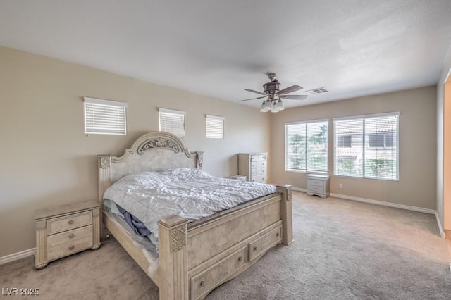 4016 Gaster Ave, North Las Vegas, NV 89081 - bedroom with light colored carpet and ceiling fan