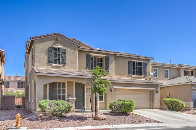 4016 Gaster Ave, North Las Vegas, NV 89081 - traditional home with stucco siding, driveway, and a garage
