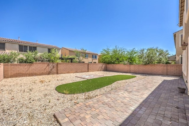 4016 Gaster Ave, North Las Vegas, NV 89081 - fenced backyard featuring a patio area