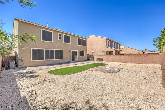 4016 Gaster Ave, North Las Vegas, NV 89081 - rear view of house featuring a fenced backyard and stucco siding