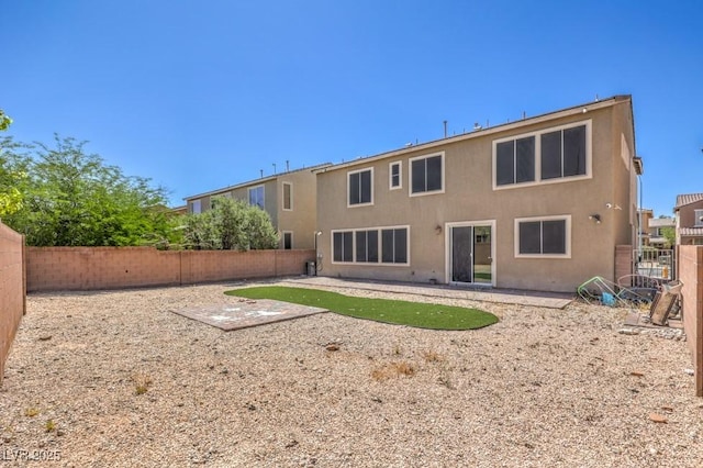 4016 Gaster Ave, North Las Vegas, NV 89081 - back of house featuring a fenced backyard, stucco siding, and a patio
