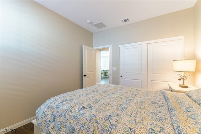 10711 Silver Pond Ave, Las Vegas, NV 89135 - bedroom featuring wood finished floors and a closet