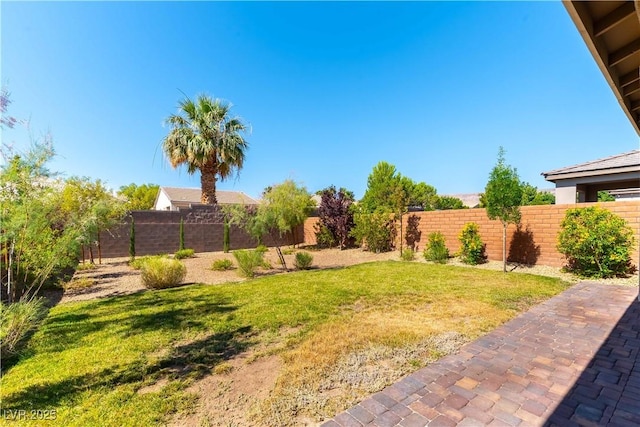 10711 Silver Pond Ave, Las Vegas, NV 89135 - fenced backyard featuring a patio area