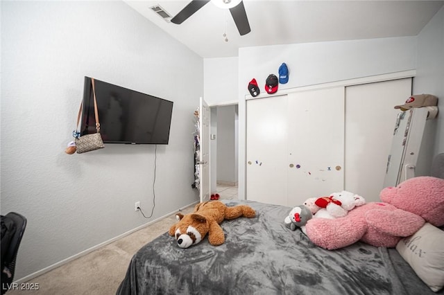 1553 Bright View Dr, Las Vegas, NV 89119 - bedroom featuring light colored carpet, a closet, and a ceiling fan