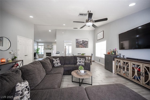 1553 Bright View Dr, Las Vegas, NV 89119 - living area featuring ceiling fan, recessed lighting, wood finished floors, and a fireplace