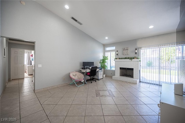 1553 Bright View Dr, Las Vegas, NV 89119 - living area featuring an office area, light tile patterned floors, high vaulted ceiling, recessed lighting, and a fireplace
