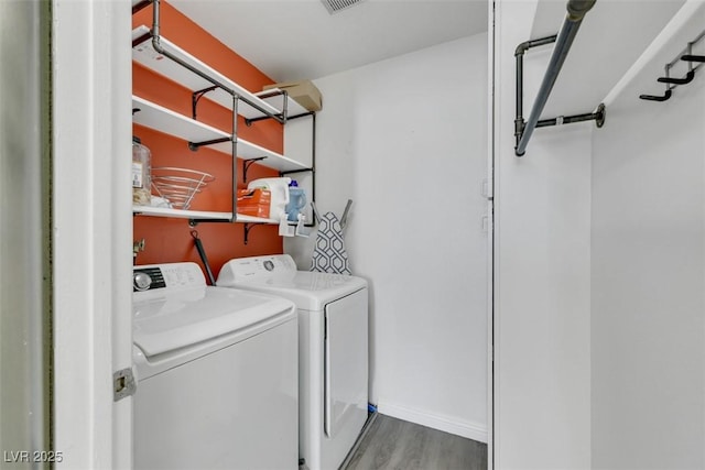 7100 Pirates Cove Rd Unit 2076, Las Vegas, NV 89145 - laundry room featuring independent washer and dryer and wood finished floors
