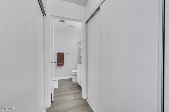 7100 Pirates Cove Rd Unit 2076, Las Vegas, NV 89145 - hall featuring baseboards and light wood-type flooring