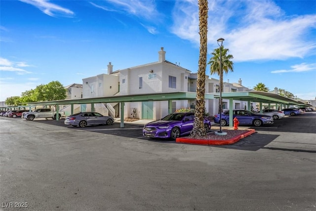 7100 Pirates Cove Rd Unit 2076, Las Vegas, NV 89145 - view of building exterior featuring covered parking