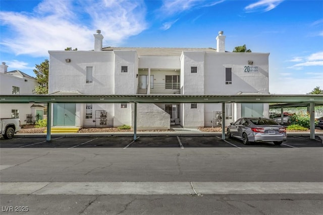 7100 Pirates Cove Rd Unit 2076, Las Vegas, NV 89145 - view of building exterior with covered parking