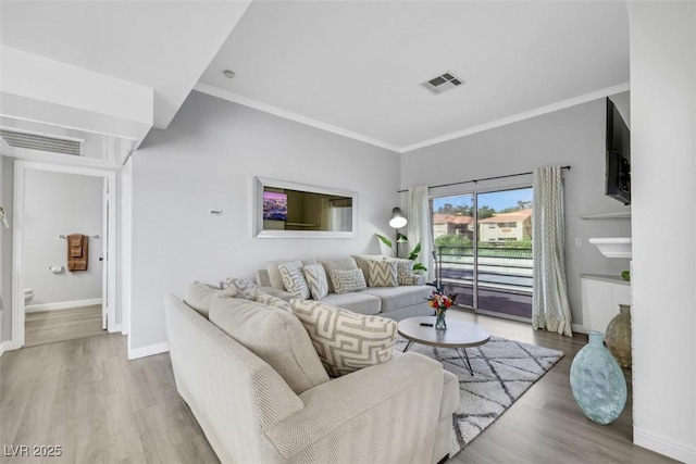 7100 Pirates Cove Rd Unit 2076, Las Vegas, NV 89145 - living room featuring wood finished floors and ornamental molding
