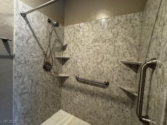 2704 Willow Wren Dr, North Las Vegas, NV 89084 - bathroom with a marble finish shower