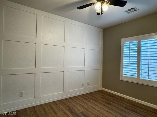 2704 Willow Wren Dr, North Las Vegas, NV 89084 - unfurnished bedroom featuring dark wood-style floors, ceiling fan, and a closet