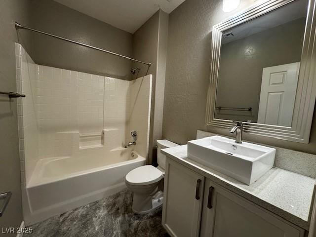 2704 Willow Wren Dr, North Las Vegas, NV 89084 - bathroom featuring a textured wall, vanity, and shower / tub combination