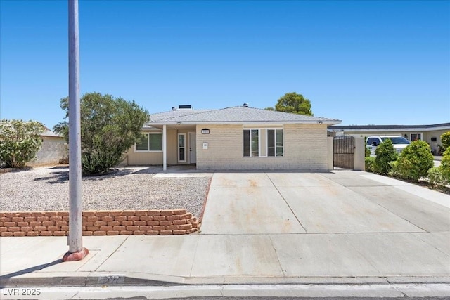 321 Oil Lantern Ln, Las Vegas, NV 89145 - ranch-style house featuring brick siding