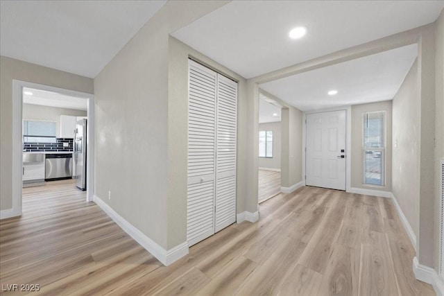 321 Oil Lantern Ln, Las Vegas, NV 89145 - foyer entrance with light wood finished floors and recessed lighting
